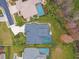 Aerial view showing house, pool, and landscaping at 2126 Larchwood Ct, Trinity, FL 34655