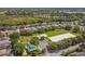 Aerial view of community, park, and homes at 2126 Larchwood Ct, Trinity, FL 34655