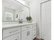 White bathroom with quartz countertop and new fixtures at 2126 Larchwood Ct, Trinity, FL 34655