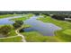 Golf course with water features and lush green landscape at 2126 Larchwood Ct, Trinity, FL 34655