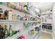 Well-organized pantry with ample shelving for storage at 2126 Larchwood Ct, Trinity, FL 34655