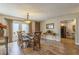 Elegant dining room with hardwood floors and a glass-top dining table at 2241 Heron Circle, Clearwater, FL 33762