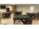 Game room with multiple poker tables at 2251 Spruce Ln # A, Palm Harbor, FL 34684