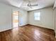 Spacious bedroom with hardwood floors and a view of another room at 229 Lime S Cir, Dunedin, FL 34698