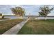 Private walkway to waterfront with picnic tables at 236 Carol Dr # 236, Seminole, FL 33772