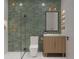 Modern bathroom with green tile, floating vanity, and frameless shower at 2502 N Highland Ave # 1, Tampa, FL 33602