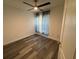 Spacious bedroom with hardwood floors and large window at 25237 Seven Rivers Cir, Land O Lakes, FL 34639