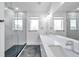 Elegant bathroom, featuring a large shower and double vanity at 2608 W Columbus Dr # 5, Tampa, FL 33607