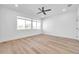 Well-lit bedroom with large windows and hardwood floors at 2608 W Columbus Dr # 5, Tampa, FL 33607