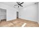 Bright bedroom with walk-in closet and light wood floors at 2608 W Columbus Dr # 5, Tampa, FL 33607