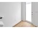 Light and bright entryway with modern door and wood floors at 2608 W Columbus Dr # 5, Tampa, FL 33607