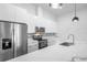 Modern kitchen with stainless steel appliances and white cabinetry at 2608 W Columbus Dr # 5, Tampa, FL 33607