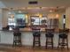 Community kitchenette with bar seating and appliances at 2616 Cove Cay Dr # 102, Clearwater, FL 33760