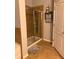 Clean bathroom with walk-in shower and tile flooring at 2815 Holly Bluff Ct, Plant City, FL 33566