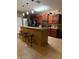 Kitchen with a breakfast bar and modern pendant lighting at 2815 Holly Bluff Ct, Plant City, FL 33566