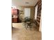 Kitchen nook with a small table and two chairs, adjacent to the kitchen at 2815 Holly Bluff Ct, Plant City, FL 33566