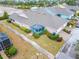 Aerial view showcasing a home's exterior and landscaping at 302 Latitude Pl, Apollo Beach, FL 33572