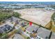 Aerial view of a single-Gathering home, highlighting its layout and landscaping at 302 Latitude Pl, Apollo Beach, FL 33572