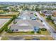 Aerial view of a home with a screened patio and landscaping at 302 Latitude Pl, Apollo Beach, FL 33572