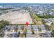 Aerial view showing a home's location near a large undeveloped lot at 302 Latitude Pl, Apollo Beach, FL 33572