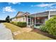 Charming home with a screened porch and landscaped backyard at 302 Latitude Pl, Apollo Beach, FL 33572