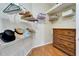 Well-organized closet with shelves and a dresser at 302 Latitude Pl, Apollo Beach, FL 33572