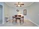 Casual dining area with wood table and seating at 302 Latitude Pl, Apollo Beach, FL 33572