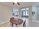 Open dining area with view into Gathering room at 302 Latitude Pl, Apollo Beach, FL 33572