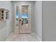 Bright entryway with double doors leading outside at 302 Latitude Pl, Apollo Beach, FL 33572