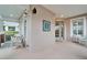 Front porch entry with seating and nautical decor at 302 Latitude Pl, Apollo Beach, FL 33572