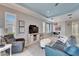 Relaxing living room with comfy seating and a view of the dining area at 302 Latitude Pl, Apollo Beach, FL 33572