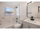 Clean bathroom, featuring marble tile and a modern vanity at 3152 Karen Ave, Largo, FL 33774