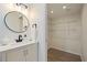 Bathroom with updated vanity and ample closet space at 3152 Karen Ave, Largo, FL 33774