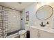 Clean bathroom with walk-in shower and updated vanity at 3152 Karen Ave, Largo, FL 33774