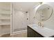 Spa-like bathroom with marble shower and shelving at 3152 Karen Ave, Largo, FL 33774