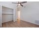 Bedroom with built-in shelving and ceiling fan at 3152 Karen Ave, Largo, FL 33774