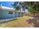 Side view of the house showing the backyard and patio at 3152 Karen Ave, Largo, FL 33774