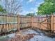 Backyard with wooden fence and gate at 3220 Salisbury Dr, Holiday, FL 34691