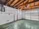 Garage with overhead storage and door opener at 3220 Salisbury Dr, Holiday, FL 34691