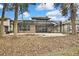 House with a large screened-in pool area at 4381 Caliquen Dr, Brooksville, FL 34604