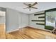 Well-lit bedroom, hardwood floors and closet at 4381 Caliquen Dr, Brooksville, FL 34604