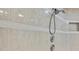 Elegant shower with tiled walls and modern fixtures at 4381 Caliquen Dr, Brooksville, FL 34604