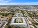 Aerial view of a large apartment complex with pool and courtyard at 4746 Azalea Dr # 105C, New Port Richey, FL 34652