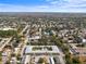 Wide aerial view of the complex and neighborhood at 4746 Azalea Dr # 105C, New Port Richey, FL 34652