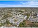 Wide aerial view of the complex and neighborhood at 4746 Azalea Dr # 105C, New Port Richey, FL 34652