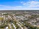 Wide aerial view of the complex and neighborhood at 4746 Azalea Dr # 105C, New Port Richey, FL 34652