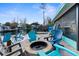 Fire pit and patio furniture overlooking the canal at 5421 Circle Dr, Weeki Wachee, FL 34607