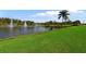 Serene lake with water fountains in River Hills at 5608 Rockfield Loop, Valrico, FL 33596