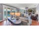 Relaxing living room with hardwood floors, fireplace, and built-in shelving at 5608 Rockfield Loop, Valrico, FL 33596