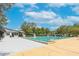 Community lap pool with lounge area at 5608 Rockfield Loop, Valrico, FL 33596